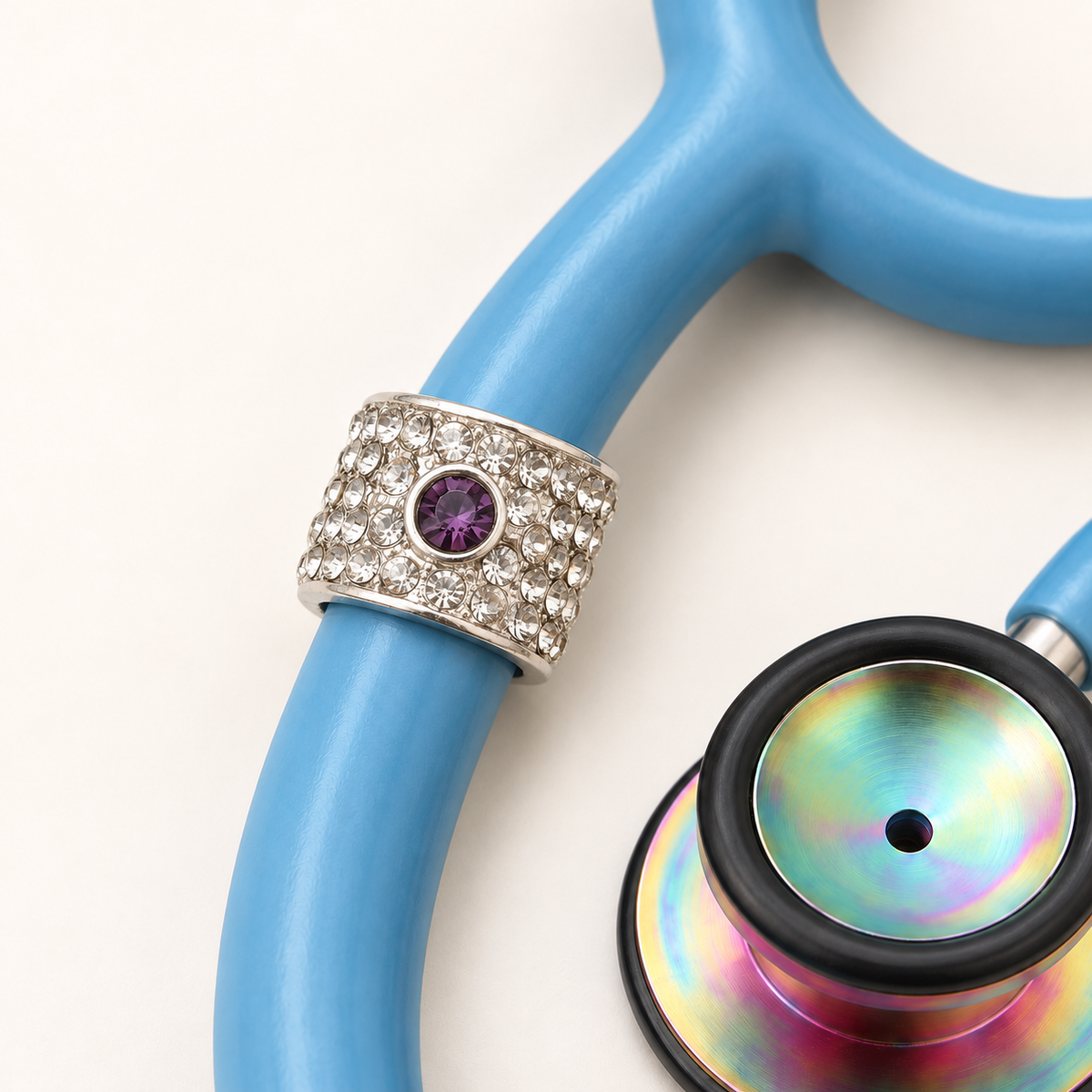 February Birth Stone Stethoscope Charm close-up on blue stethoscope