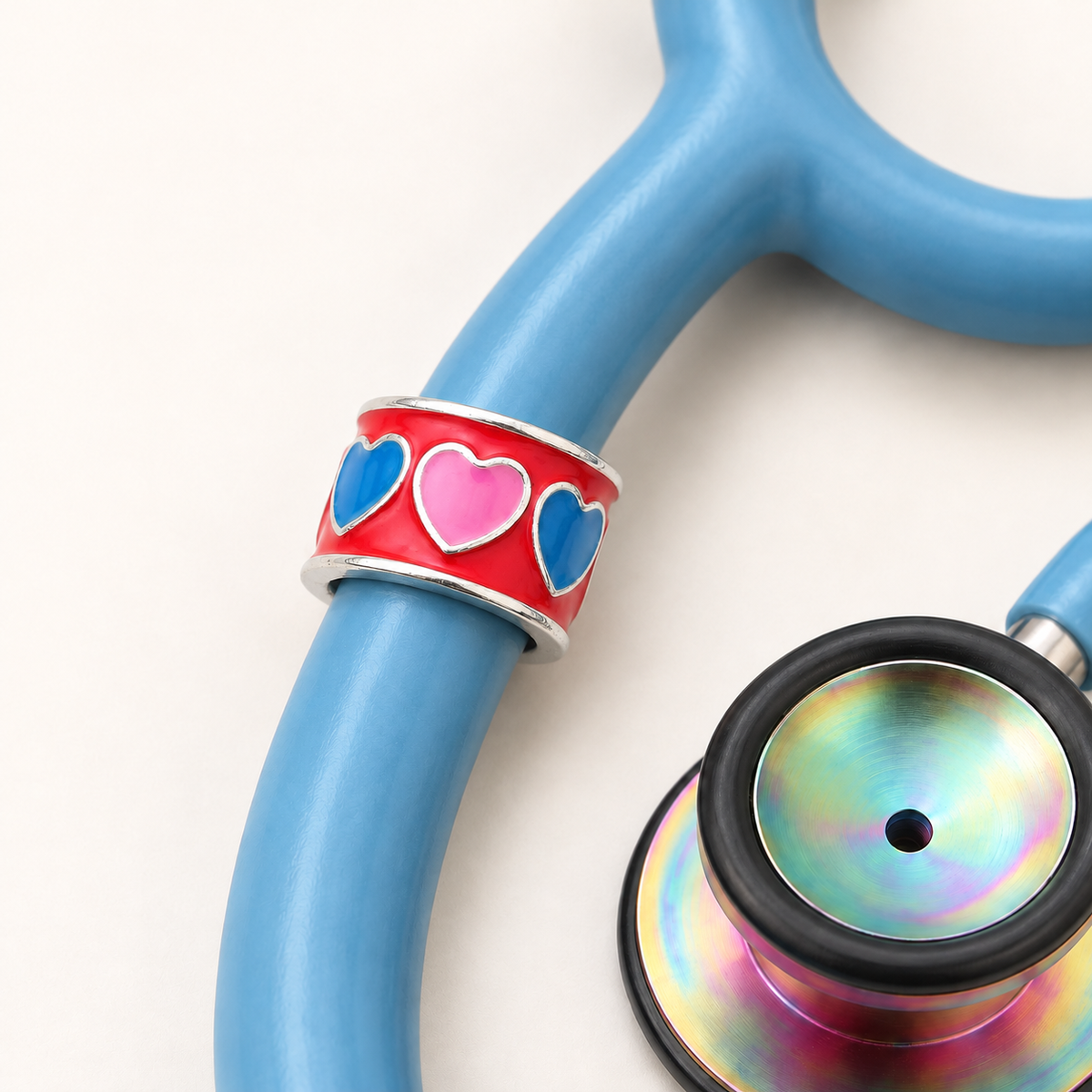 Candy Hearts Stethoscope Charm close-up on blue stethoscope