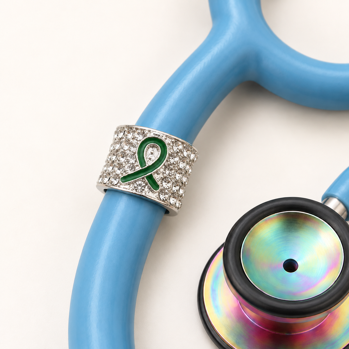 Green Ribbon Stethoscope Charm close-up on blue stethoscope