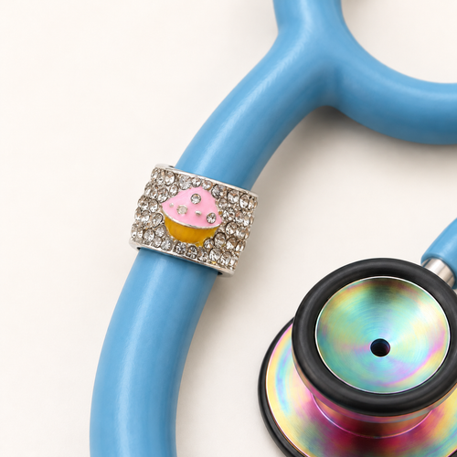 Cupcake Stethoscope Charm close-up on blue stethoscope