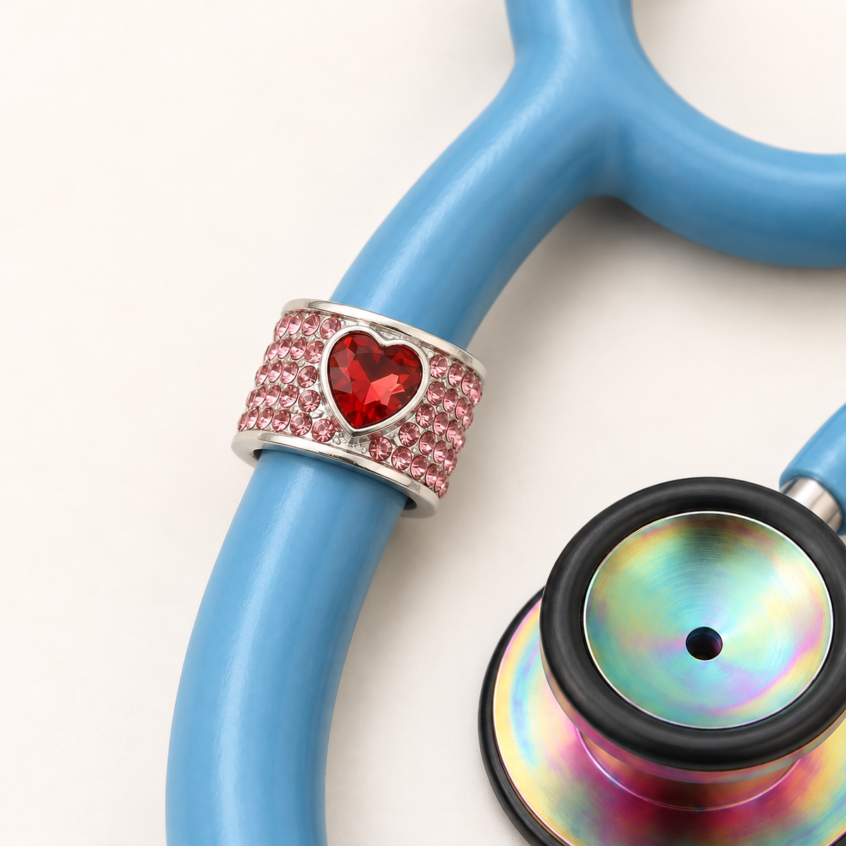 Love Stethoscope Charm close-up on blue stethoscope