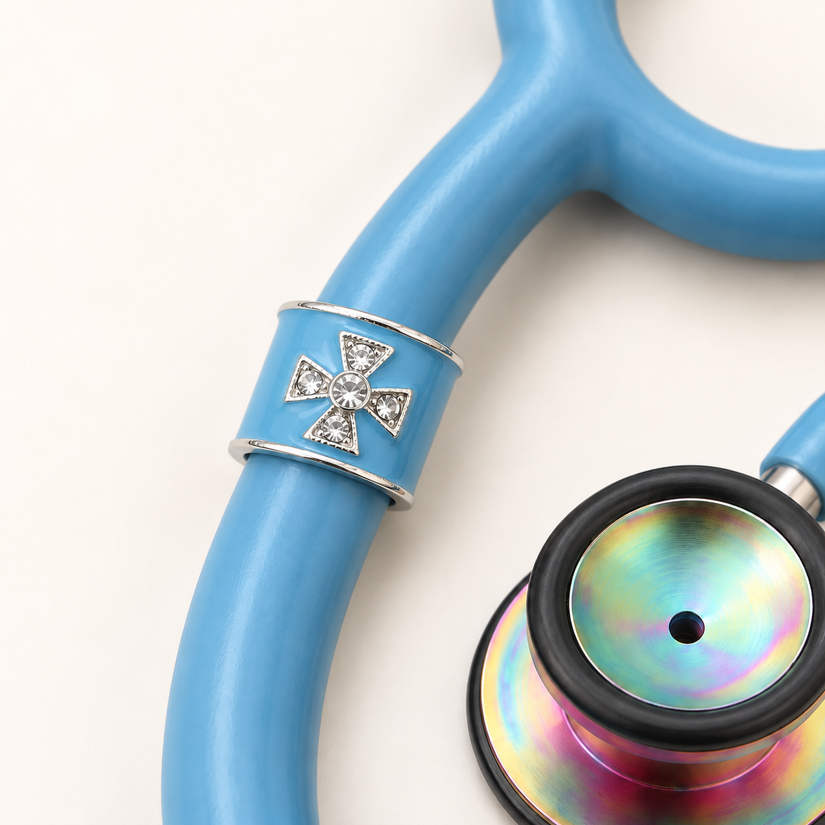 Maltese Cross Stethoscope Charm close-up on blue stethoscope