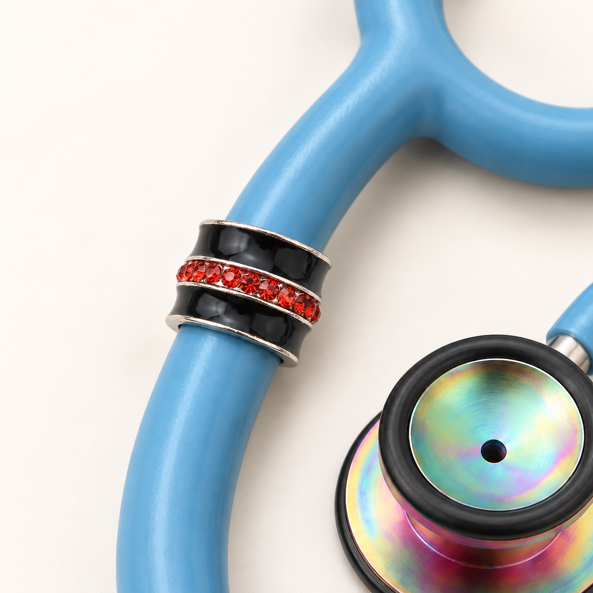 Thin Red Line of Courage Stethoscope Charm close-up on blue stethoscope