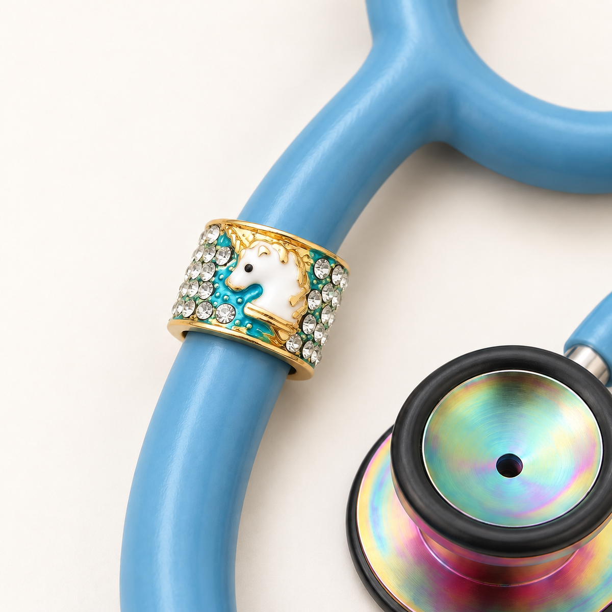 Unicorn Stethoscope Charm close-up on blue stethoscope