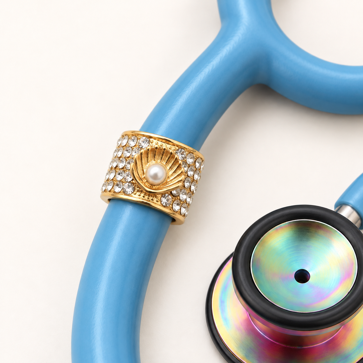 Ocean's Treasure Stethoscope Charm close-up on blue stethoscope