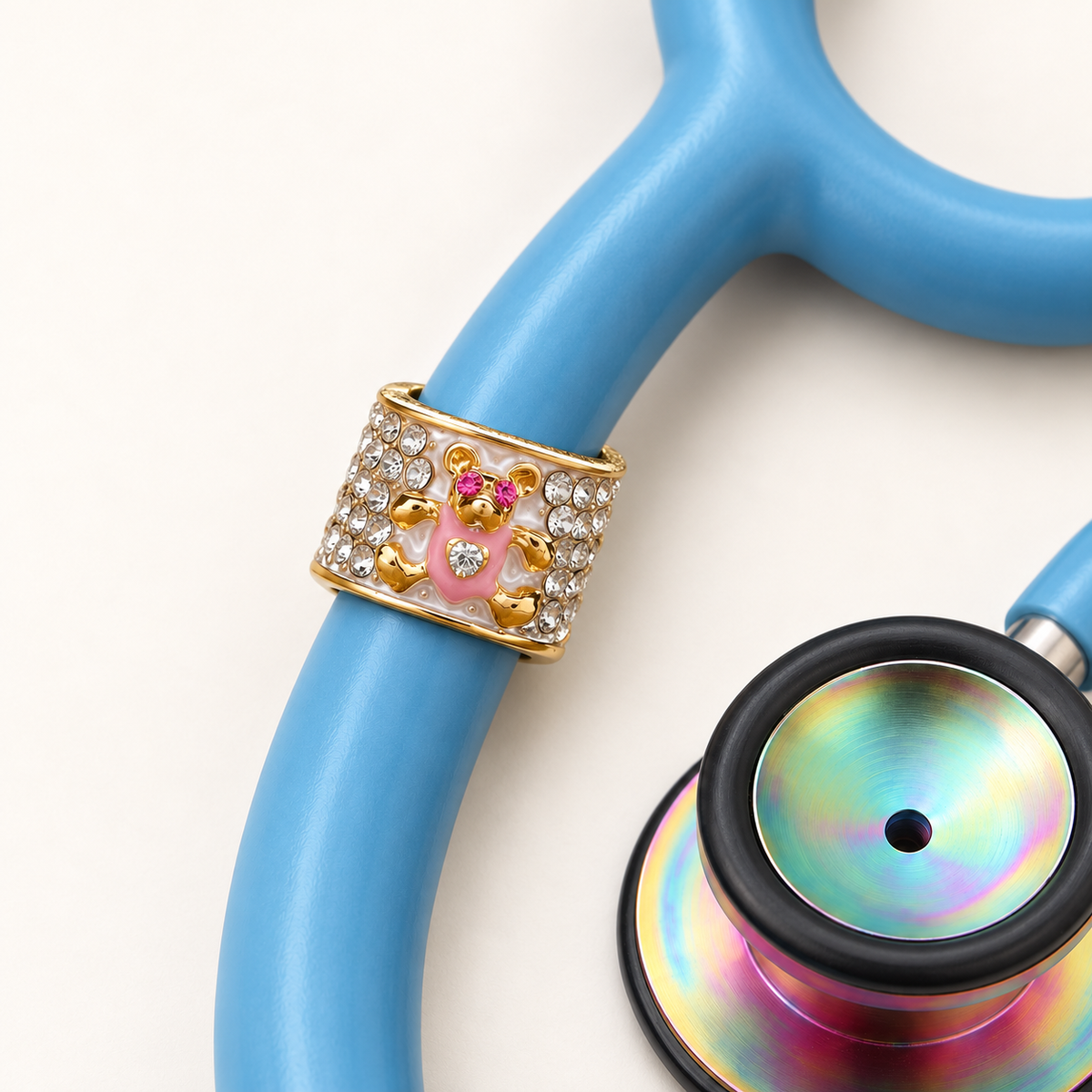 Teddy Bear Stethoscope Charm close-up on blue stethoscope