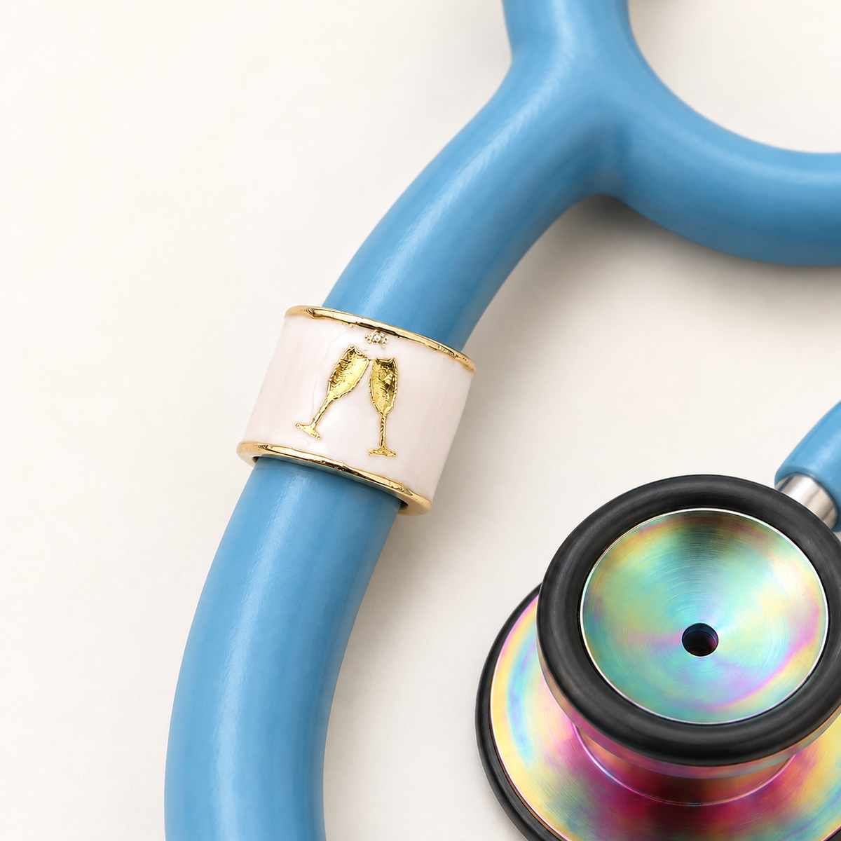 Cheers! Stethoscope Charm close-up on blue stethoscope