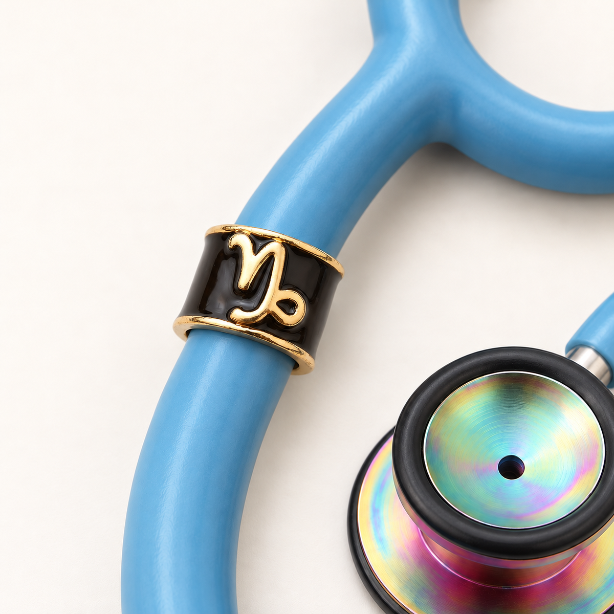 Capricorn Stethoscope Charm close-up on blue stethoscope