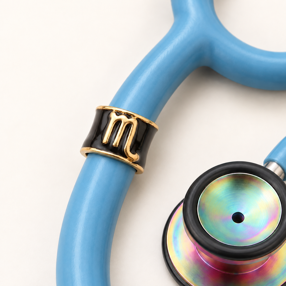 Scorpio Stethoscope Charm close-up on blue stethoscope